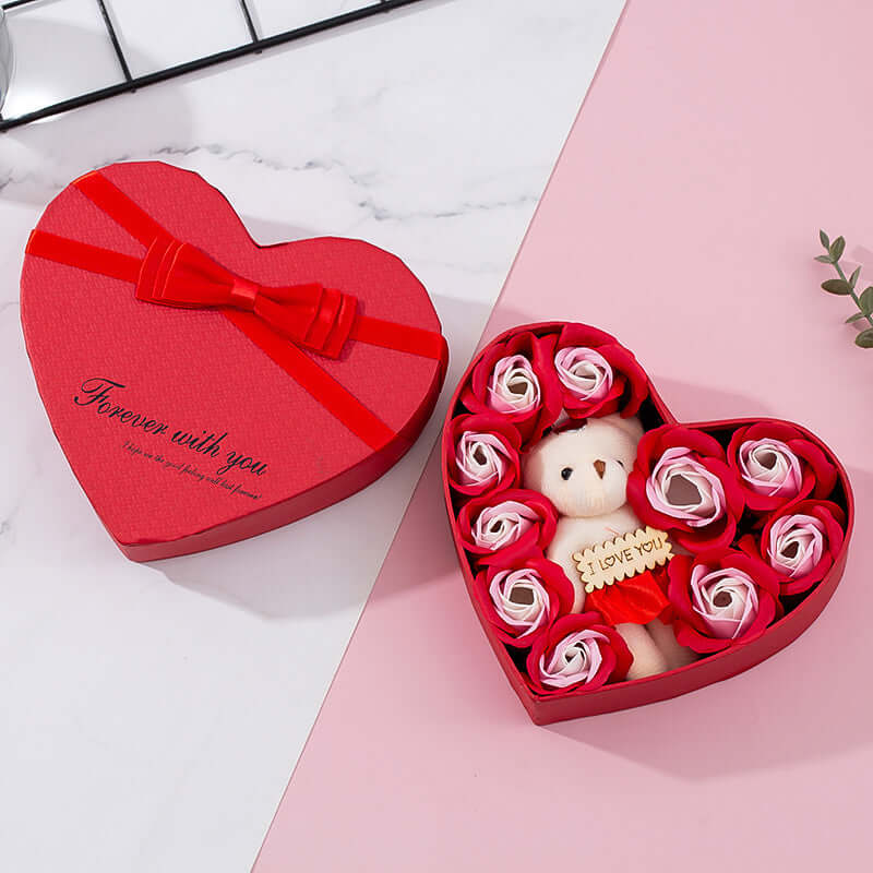 romantic heart gift box featuring a plush bear and rose petals for special occasions