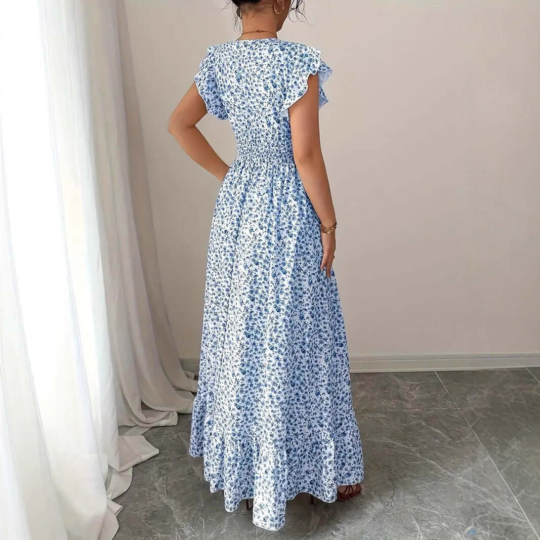 Women's floral summer dress with ruffle sleeves in light blue floral pattern, perfect for casual occasions.
