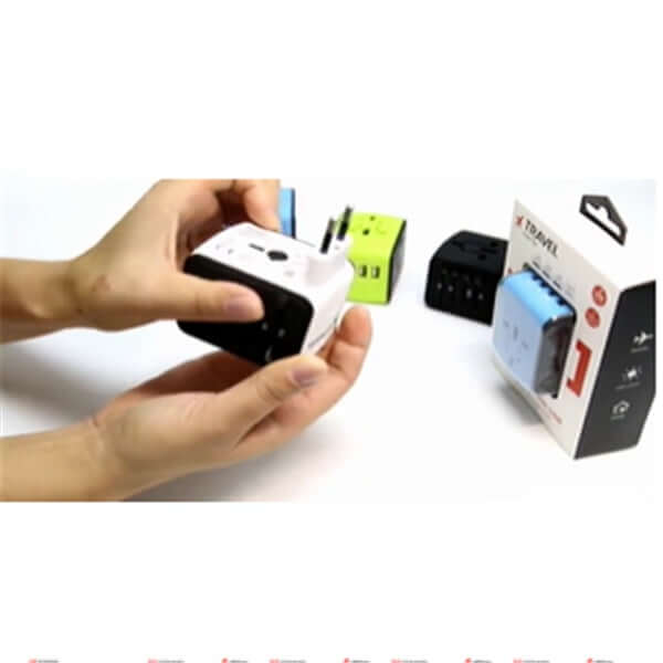 Multi-function power socket adapter being used with packaging and different colored outlets.
