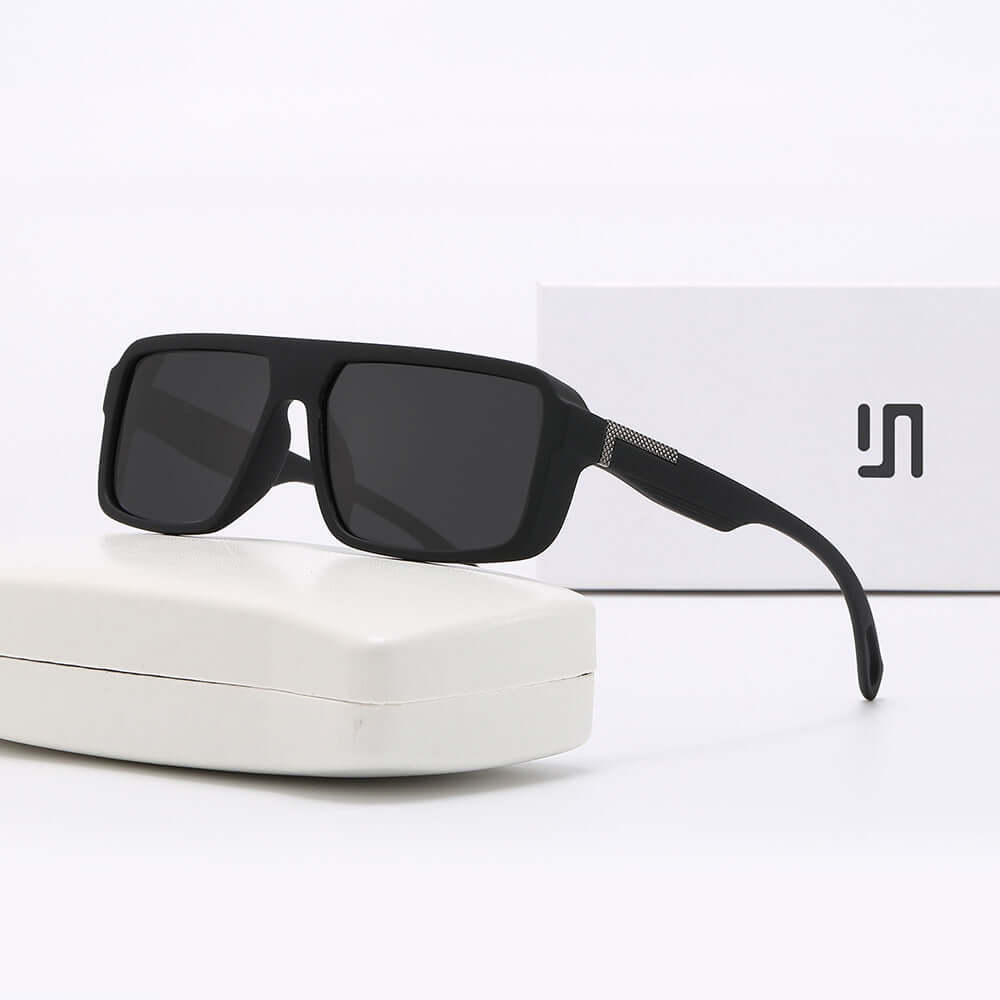 Polarized UV400 sunglasses for men displayed with a protective case, showcasing anti-glare lenses and sleek design.