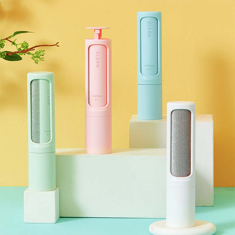 Self cleaning pet hair remover brushes in different colors on display, designed for effective hair removal.