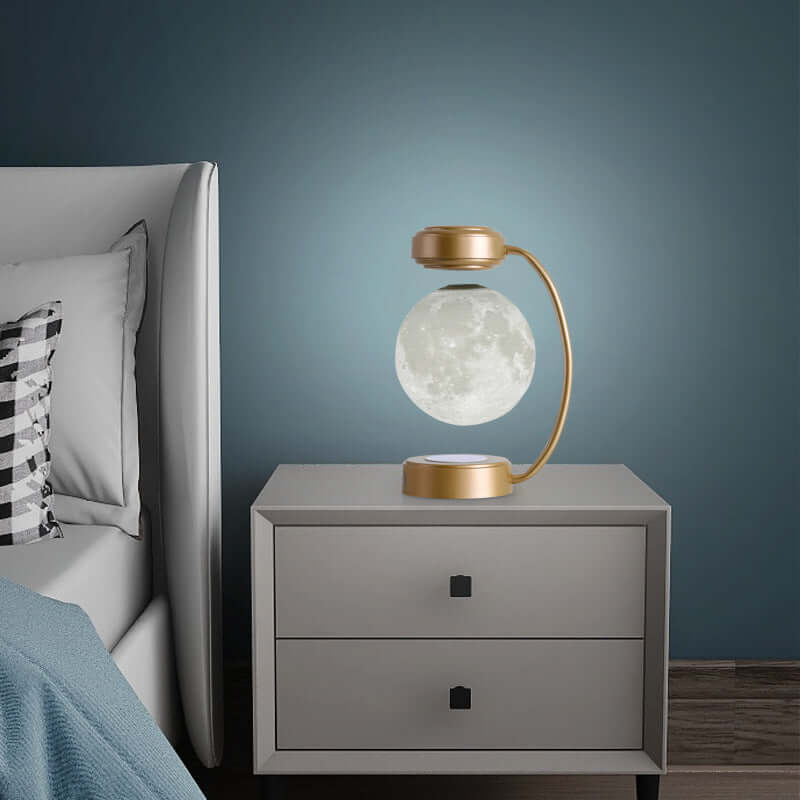 levitating 3D moon lamp on a nightstand in a cozy bedroom setting, showcasing its unique design and warm glow.
