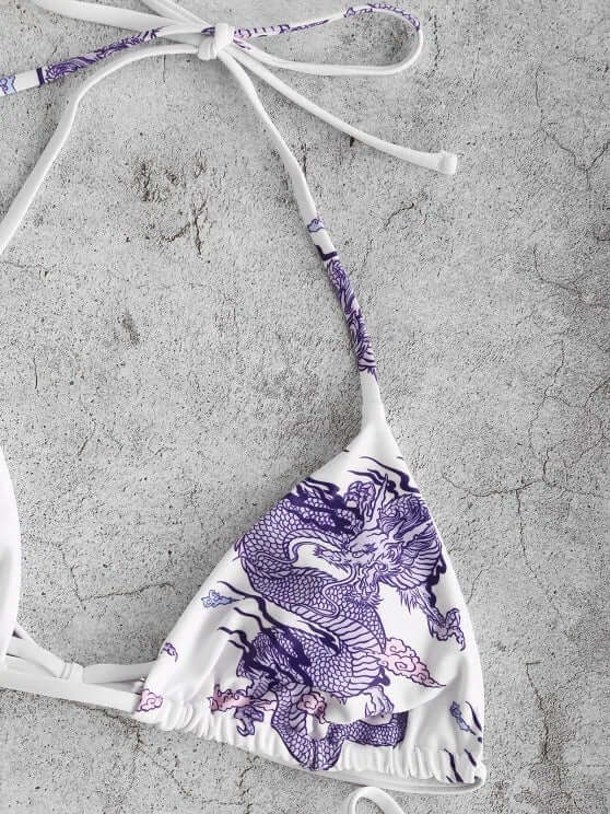 Sexy printed bikini featuring a purple dragon design on a white background, perfect for stylish summer swimwear.
