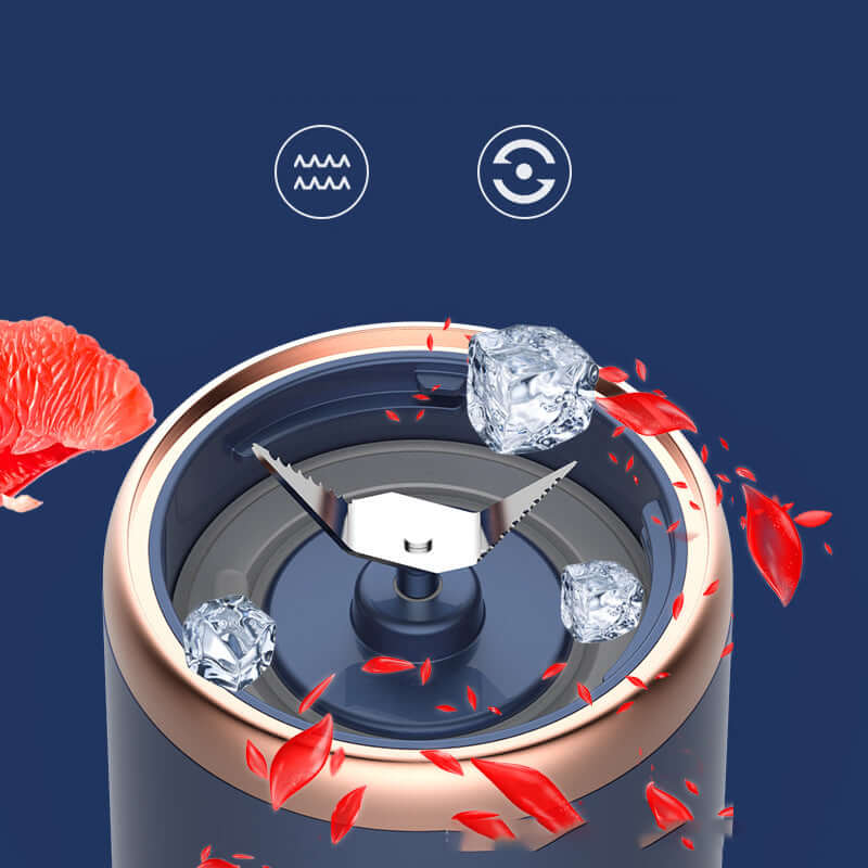 Close-up of portable USB juicer machine blades with ice cubes and fruit, showing blending capability.
