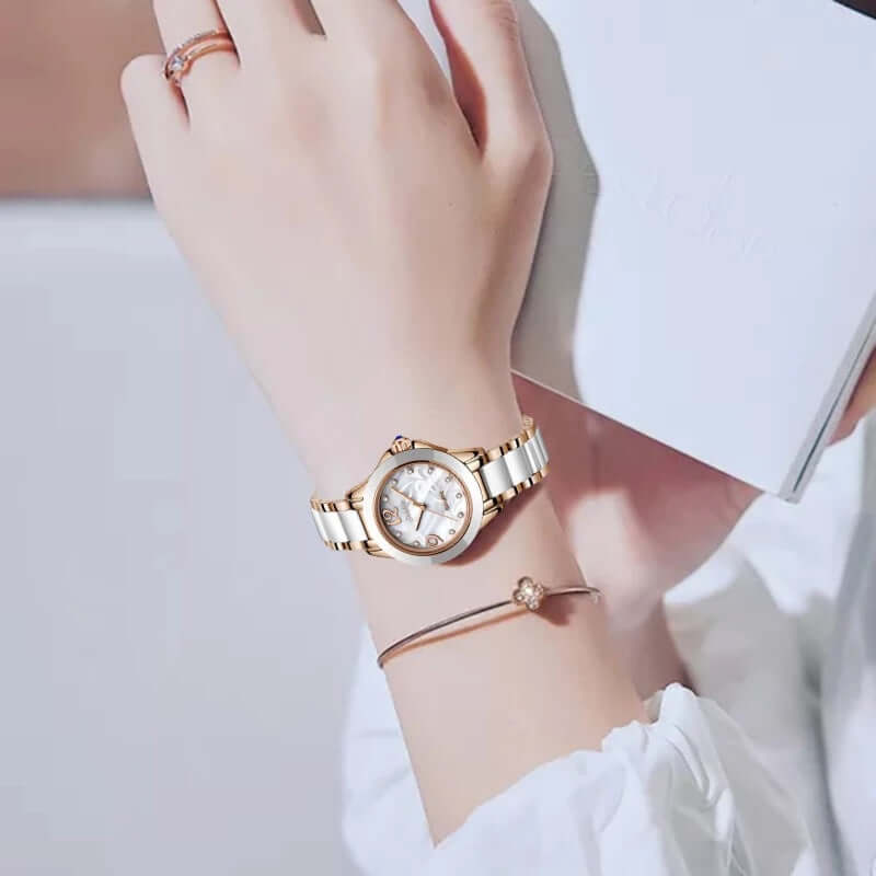 Ceramic ladies watch on a woman's wrist, featuring a luxurious ceramic strap and elegant design.