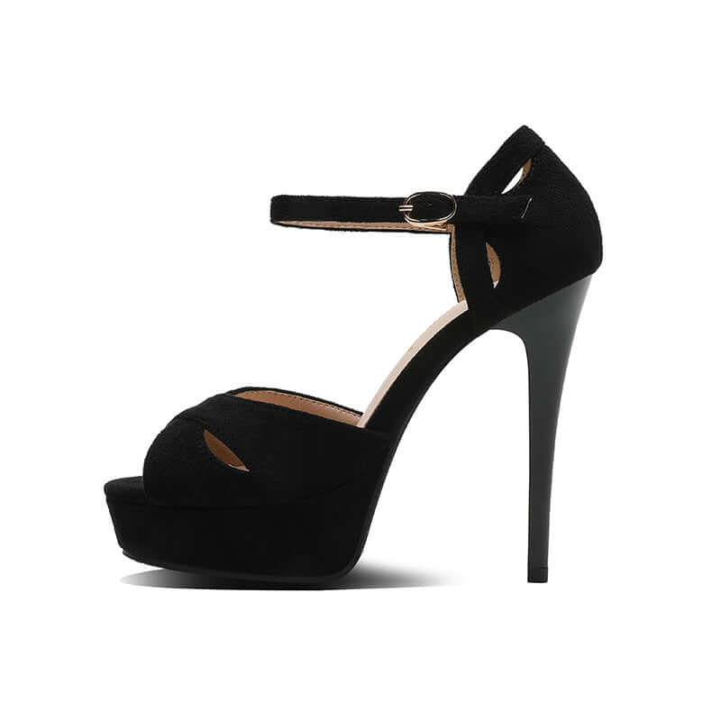 Elegant pointed-toe stiletto heels in black suede showing side profile with ankle strap.