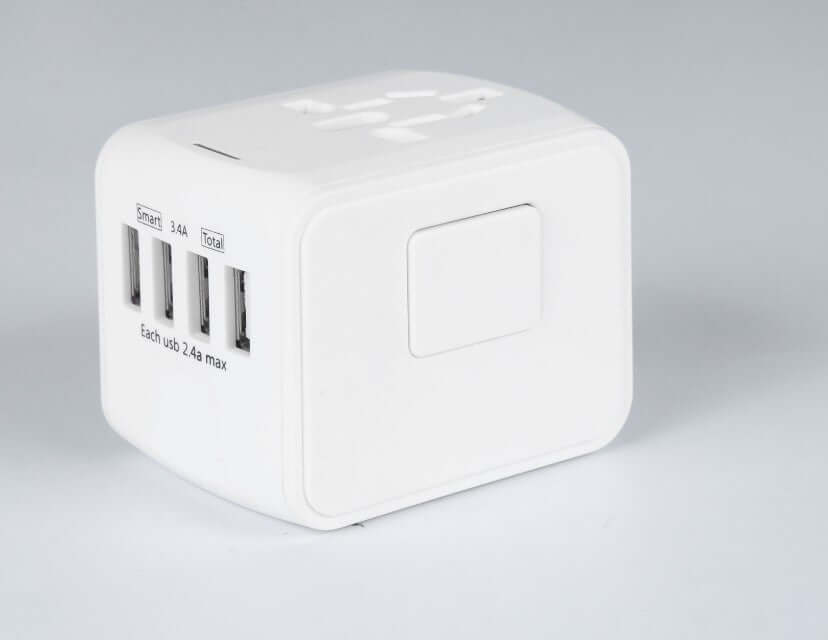 Multi-function power socket adapter with multiple USB outlets and compact design for home, office, and travel use.