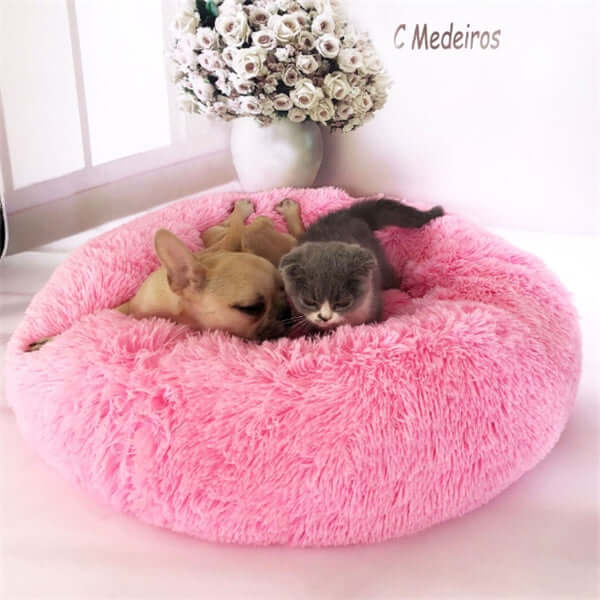 Cozy cat mattress with a pink fluffy design, perfect for small pets like kittens and puppies to snooze.