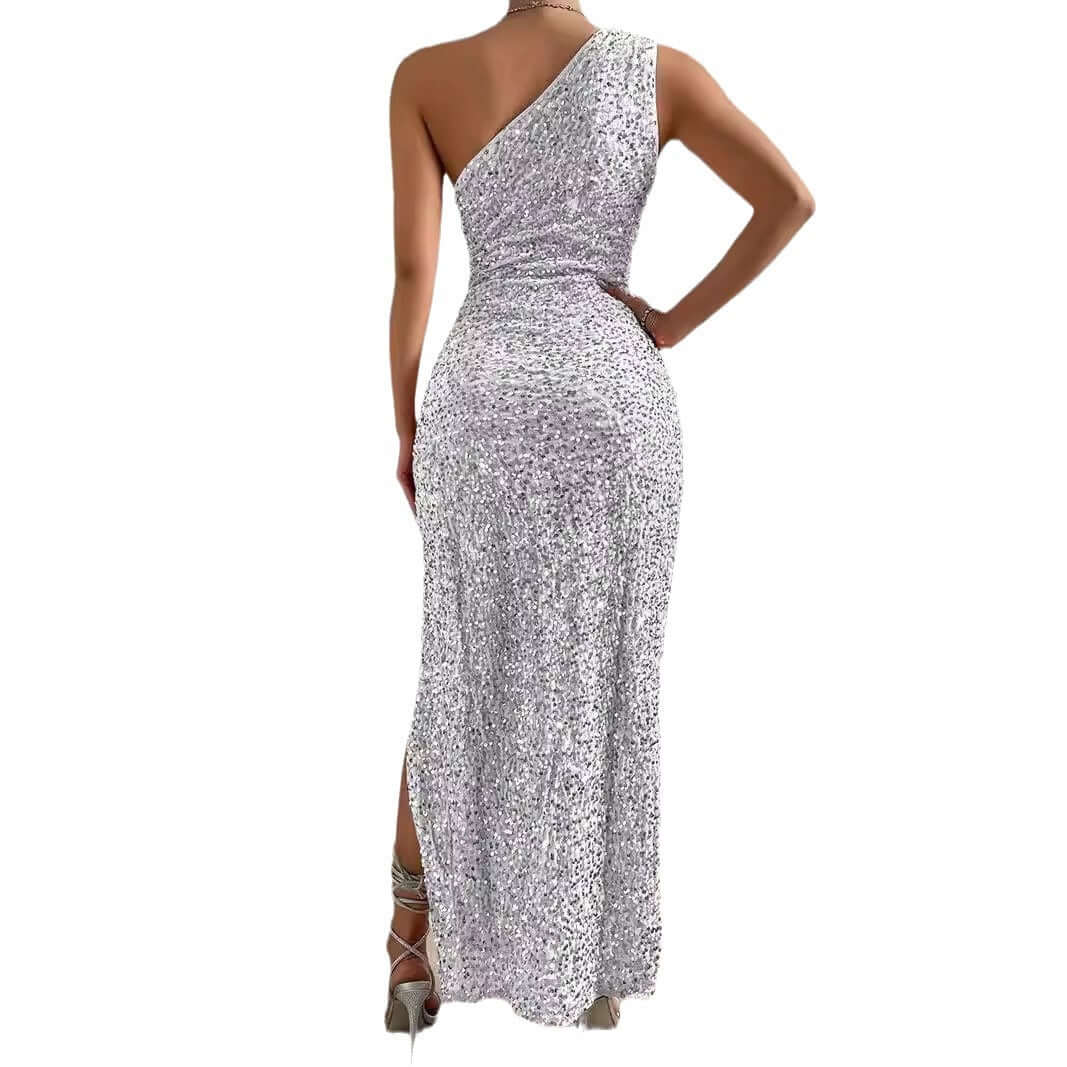 Sexy sequined evening dress showcased from the back, featuring a one-shoulder design and a long, elegant silhouette.