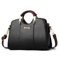 Stylish women's handbag shoulder bag featuring elegant black leather design with chic gold accents.