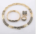 Stunning costume jewelry sets for women featuring elegant black and gold design in necklace, bracelet, earrings, and ring.
