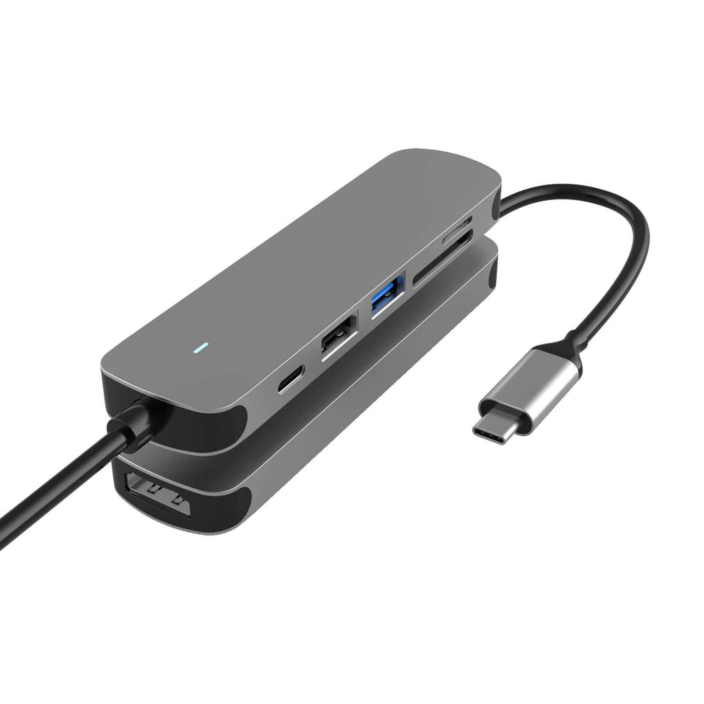 Compact USB hub for laptop with multiple ports and sleek design, ideal for home offices and travel setups.