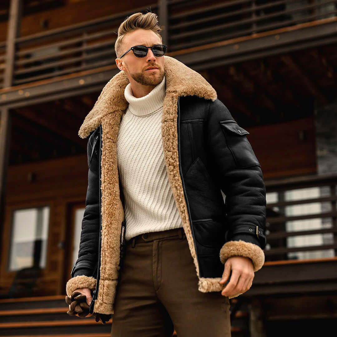Stylish man wearing a warm padded winter jacket with fur collar, showcasing trendy winter fashion outdoors.
