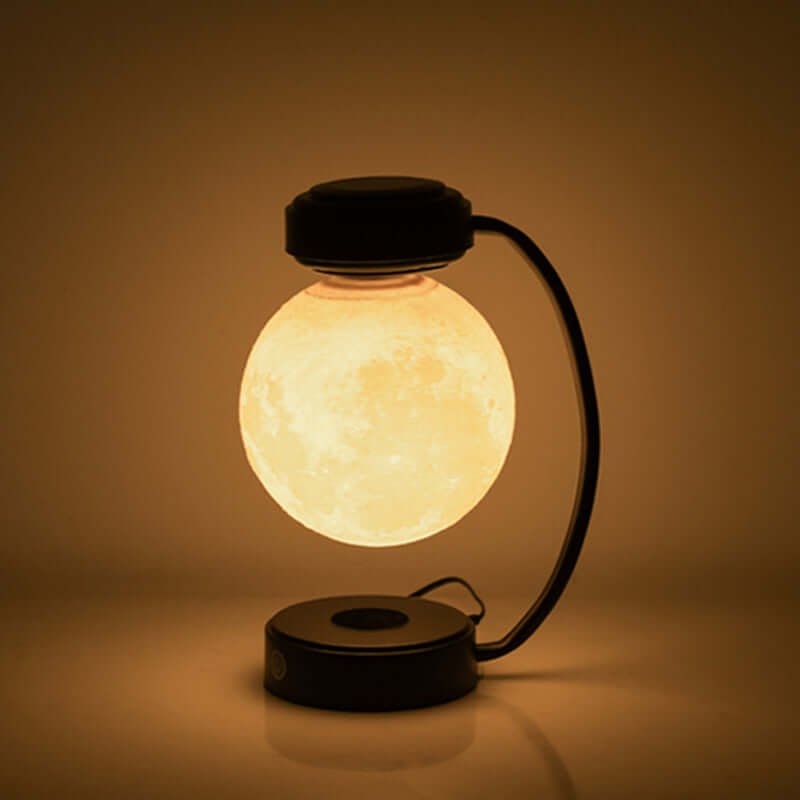 Luminous levitating 3D moon lamp rotating in mid-air, providing soft glow for home and office decor.