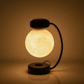 Luminous levitating 3D moon lamp rotating in mid-air, providing soft glow for home and office decor.