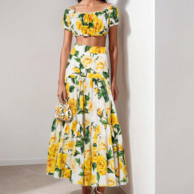 Women's printed skirt two-piece outfit featuring a floral crop top and long skirt, perfect for smart casual occasions.
