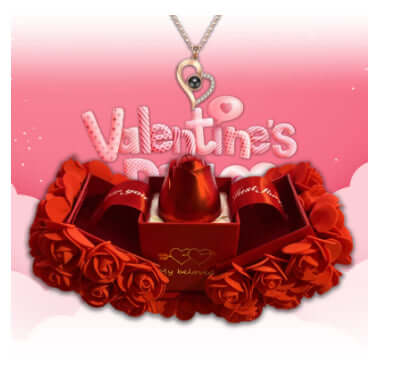 Luxury rose gift box with crystal pendant for Valentine's Day, featuring red roses and a sparkling necklace.