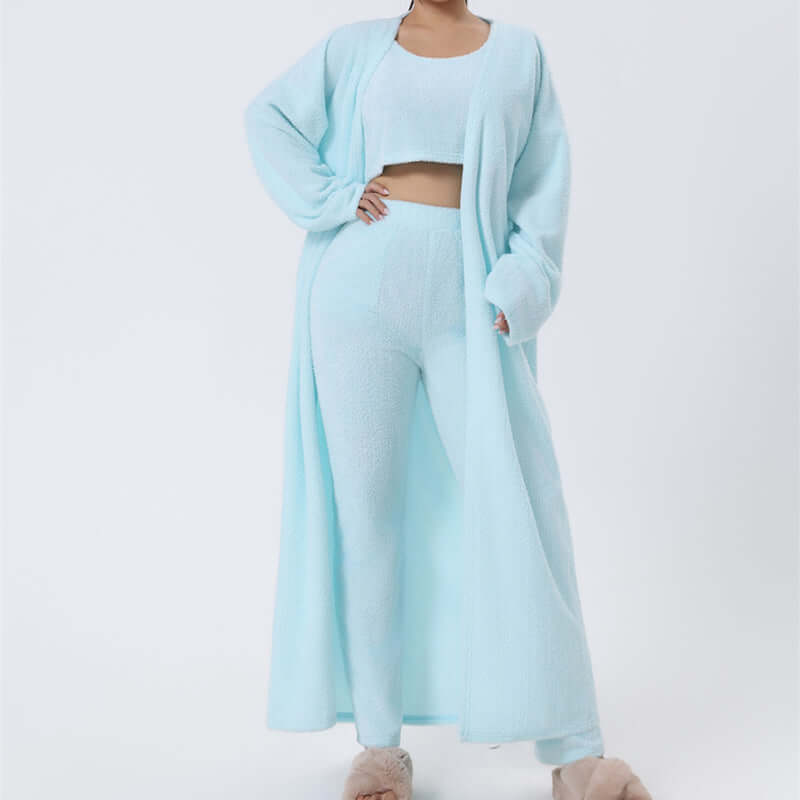 women's cozy loungewear set in light blue, featuring a long cardigan and matching pants, ideal for relaxation.