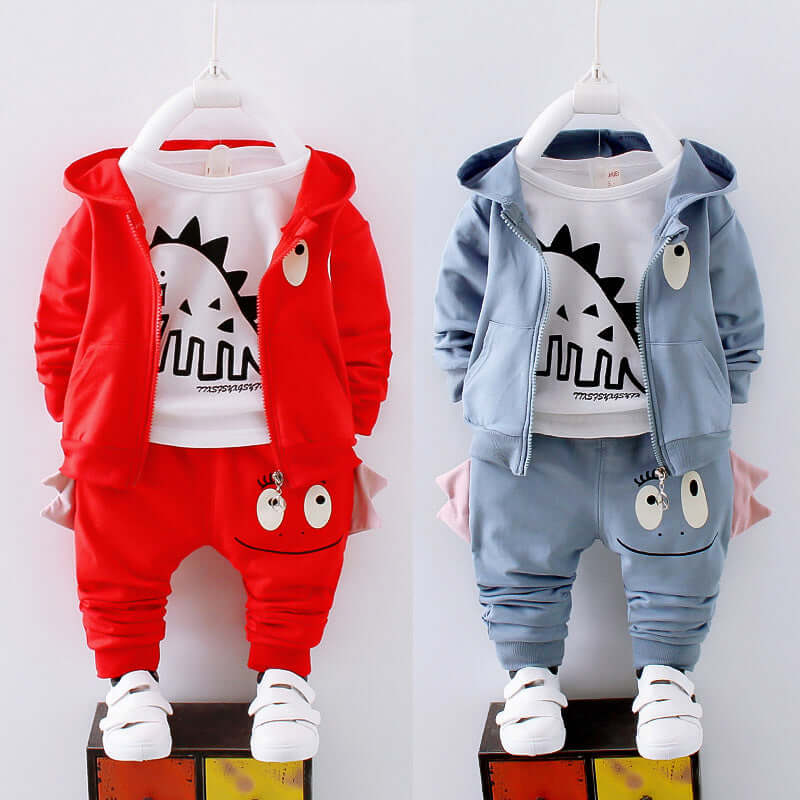 Cotton children's clothing featuring soft, cute dinosaur designs for boys and girls in red and blue.