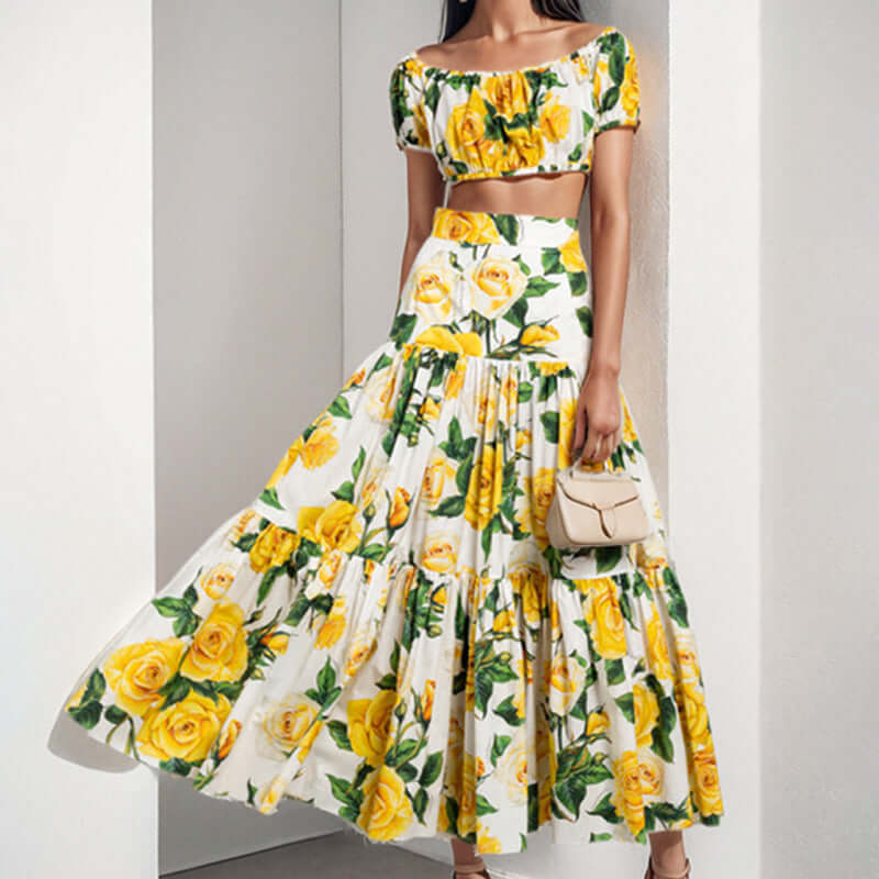 Women's printed skirt two-piece outfit featuring a floral top and tiered skirt, perfect for stylish commuting.