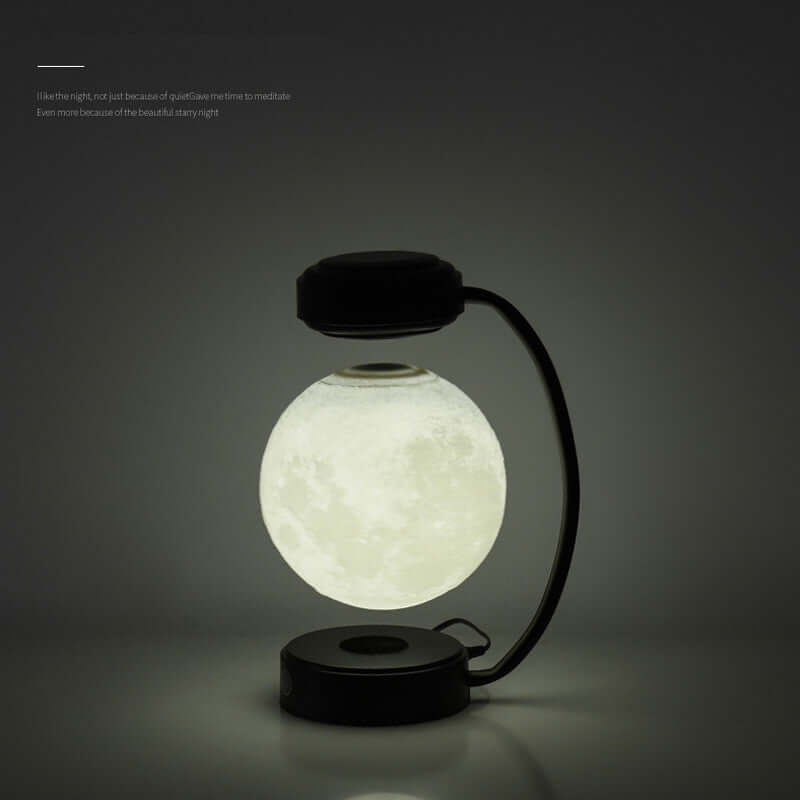 Levitating 3D moon lamp floating and illuminating with a soft glow in a stylish black and white design.