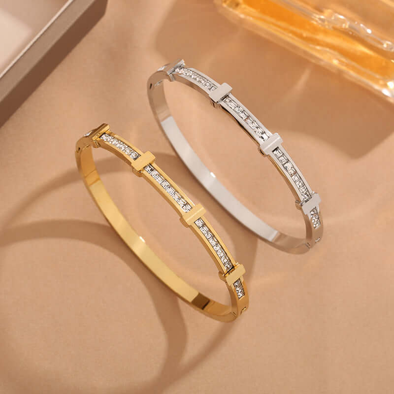 Rhinestone crystal bangle in gold and silver colors showcasing sparkling crystal details.