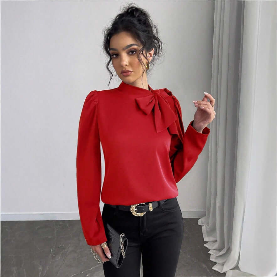 Elegant long sleeve shirt in red with bow detail, perfect for stylish casual wear.