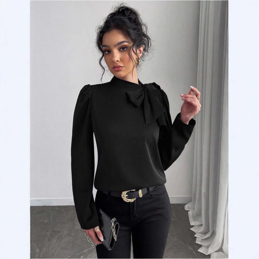 Elegant long sleeve shirt in black with bow detail, perfect for stylish casual or formal wear.