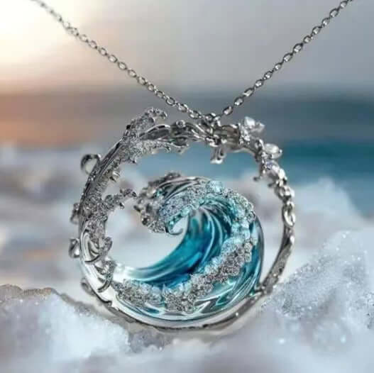 Stainless steel spray finish necklace featuring a wave design with blue and clear gemstones, ideal for unisex daily wear.