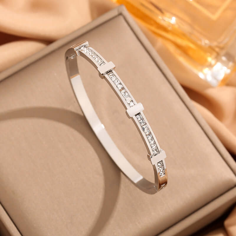 Rhinestone crystal bangle on a soft surface, sparkling with a stylish design for women.