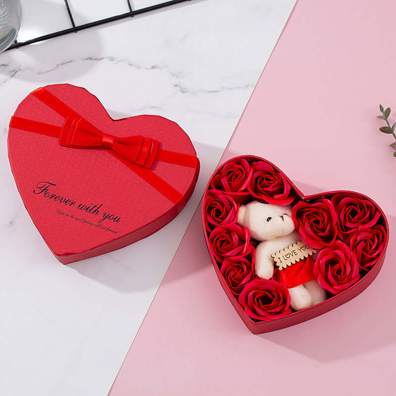 Romantic heart gift box featuring a teddy bear and red roses, perfect for special occasions.