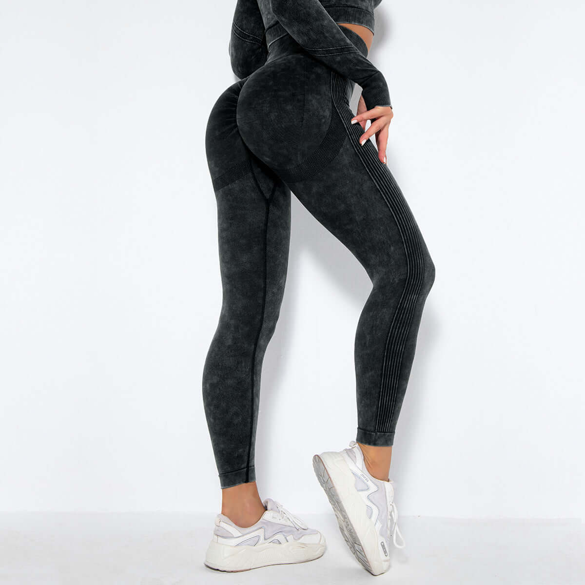 Women's washed sports leggings in black, made from nylon-spandex blend, perfect for workout and yoga.