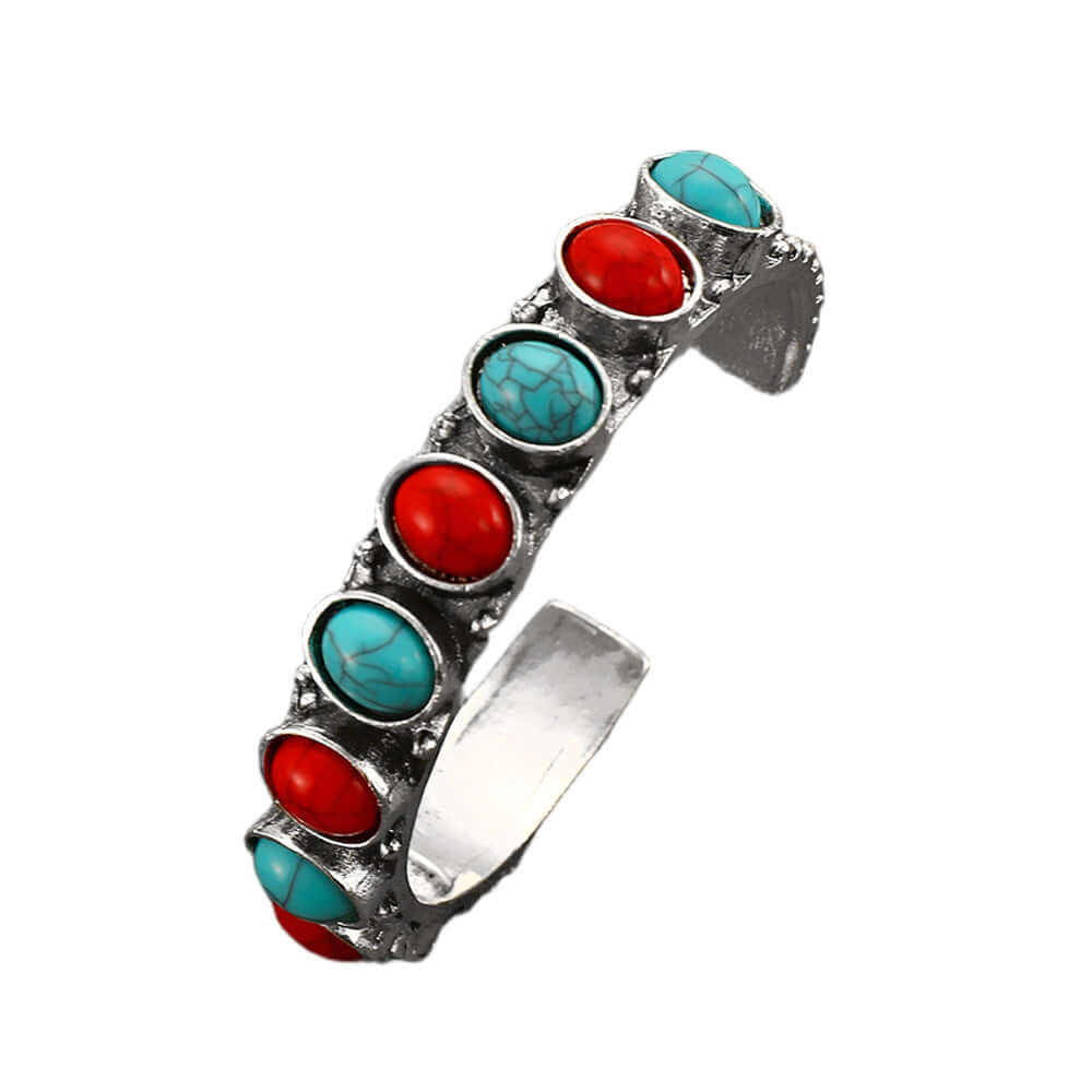 Ring-shaped electroplated bracelet featuring red and turquoise stones, bold jewelry for women.