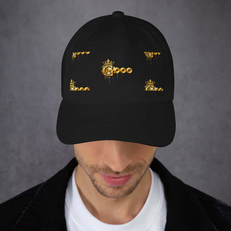 Low profile dad hat featuring gold graphics on a black background, perfect for casual wear.