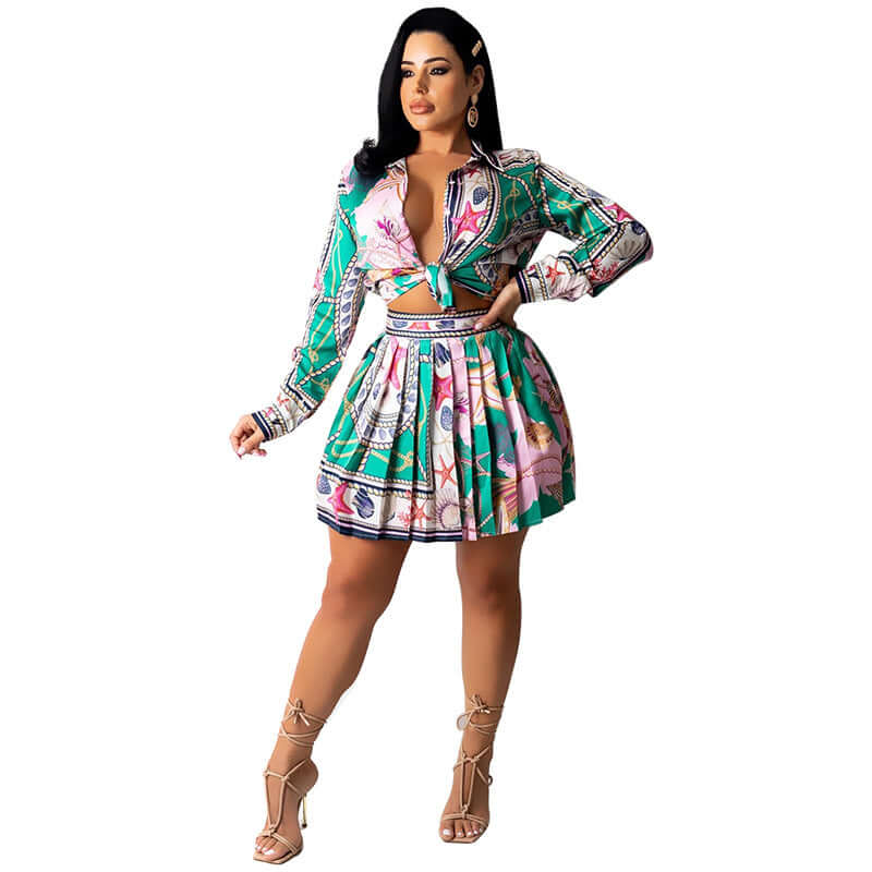 Model showcasing a stylish long sleeve skirt suit with vibrant prints and a trendy design.