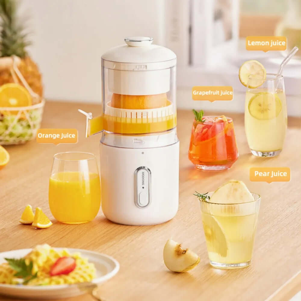 Wireless electric orange juicer with fresh juices displayed, including orange, lemon, grapefruit, and pear juice.