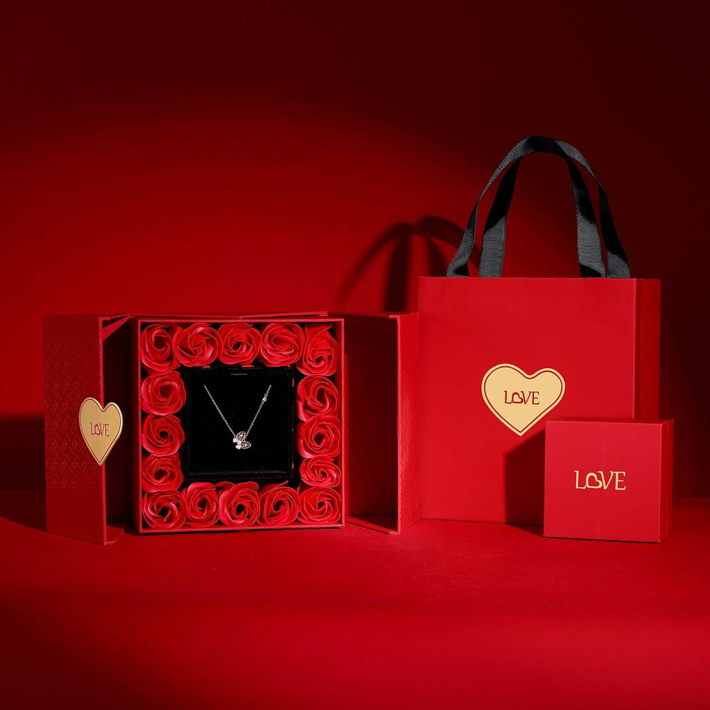 Romantic luxury gift box featuring roses and necklace, perfect for Valentine's Day gifting.