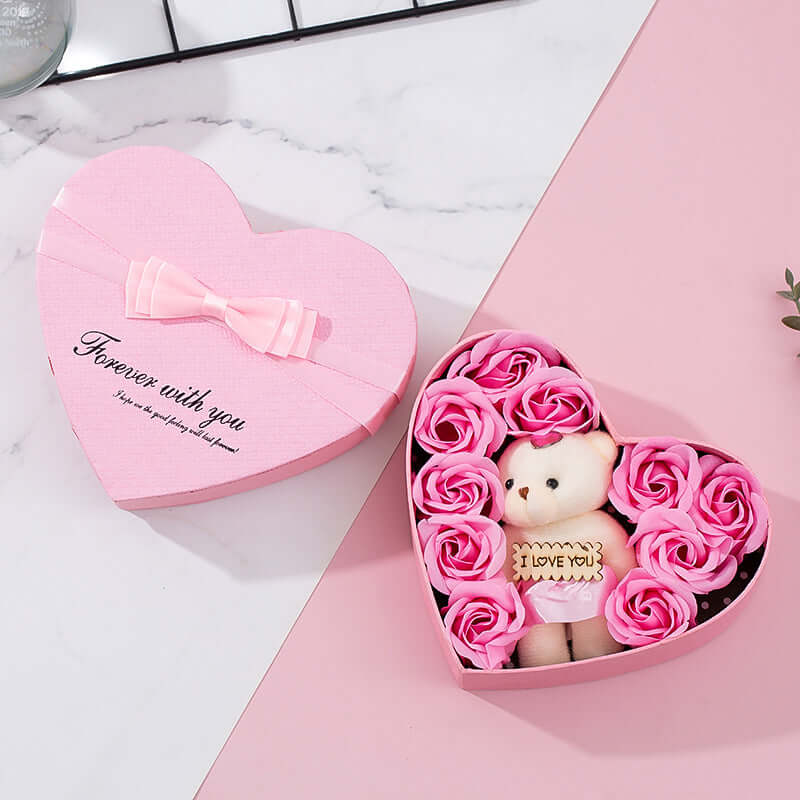 Heart-shaped gift box with pink roses and teddy bear, perfect for a romantic heart gift box.