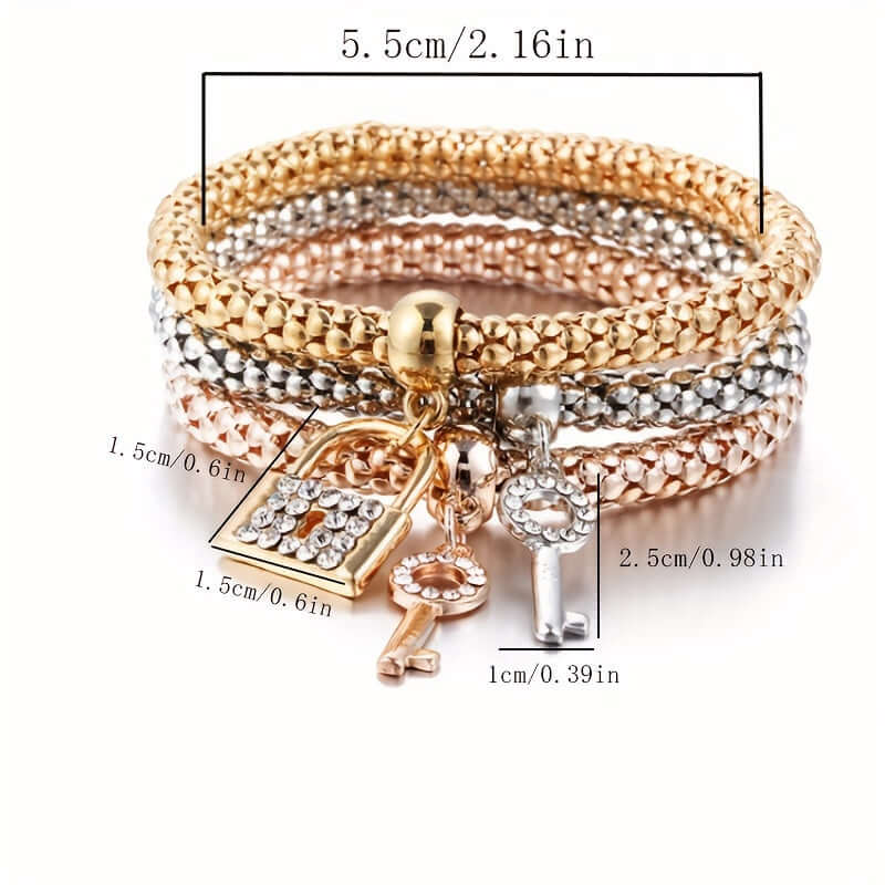 Lock and key bracelet set featuring a sparkling rhinestone lock and key charm, crafted in zinc alloy.