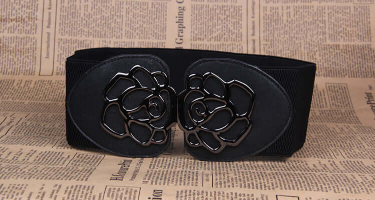 Slim women's waist belt with floral buckle design, ideal for dresses and outfits.